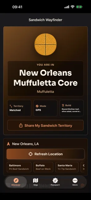 Sandwich Wayfinder matching a New Orleans location by GPS to the Muffuletta Core territory, built on a round Sicilian loaf with olive salad and cured meats